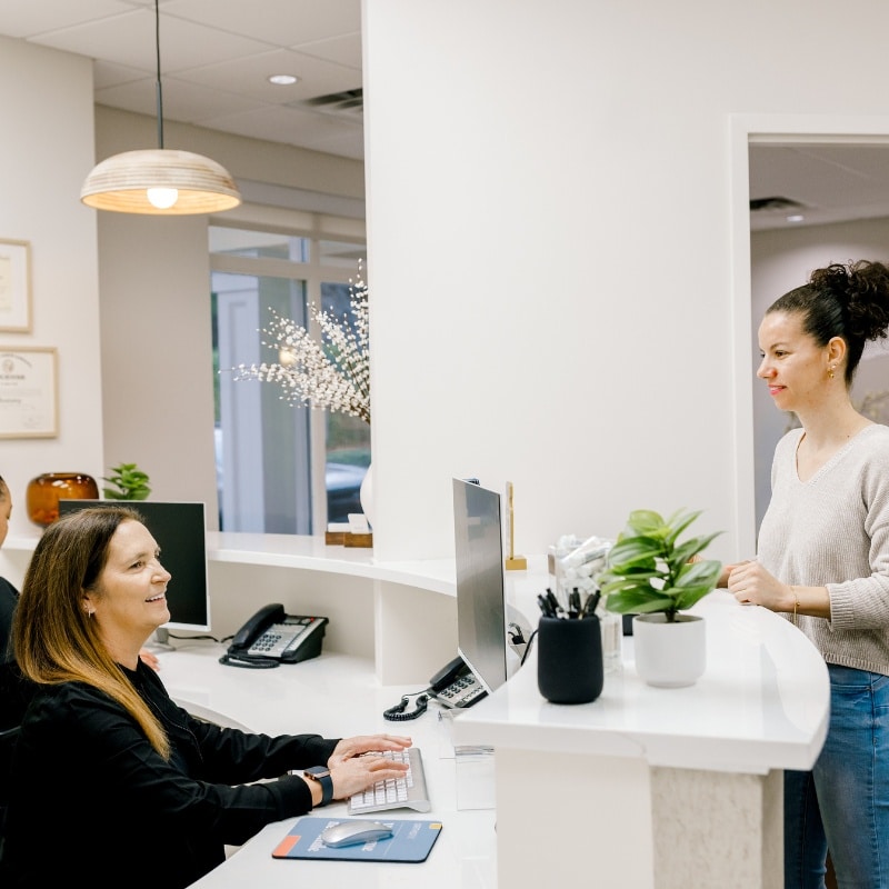Woman at front desk