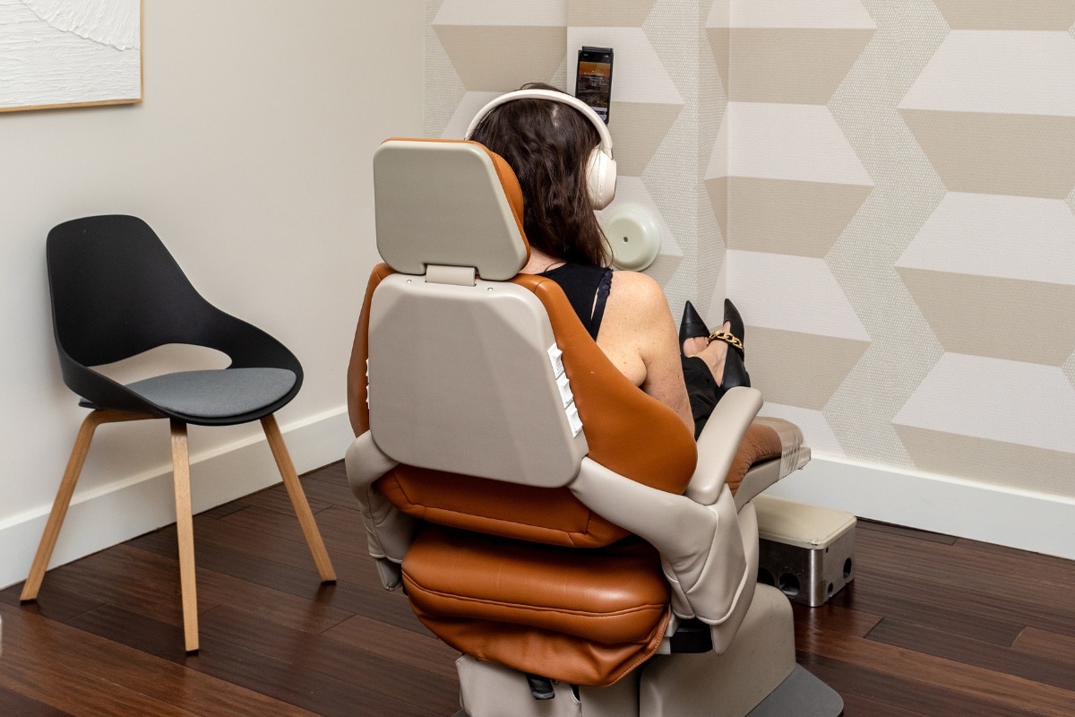 Woman sitting in dental chair